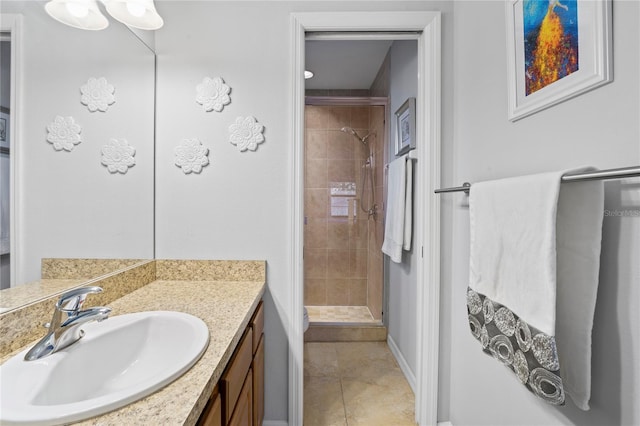 6315 Shane Ln, New Port Richey, FL 34653 - bathroom featuring vanity, a shower stall, baseboards, and tile patterned floors