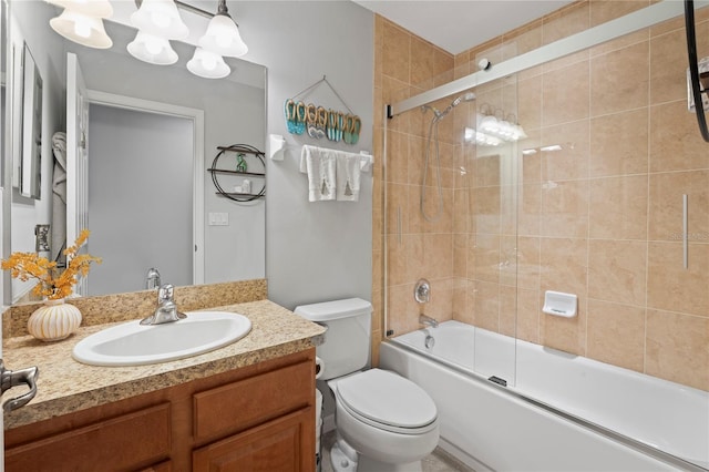 6315 Shane Ln, New Port Richey, FL 34653 - bathroom featuring vanity, toilet, and combined bath / shower with glass door