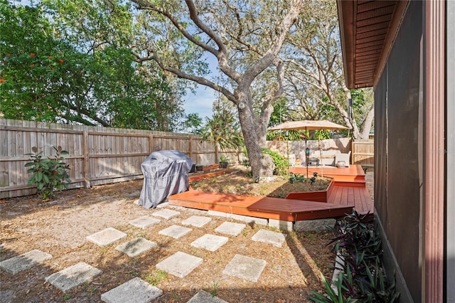 6315 Shane Ln, New Port Richey, FL 34653 - fenced backyard with a wooden deck