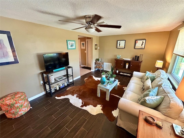 7861 Raintree Dr, New Port Richey, FL 34653 - living area with ceiling fan, wood finished floors, baseboards, and a textured ceiling