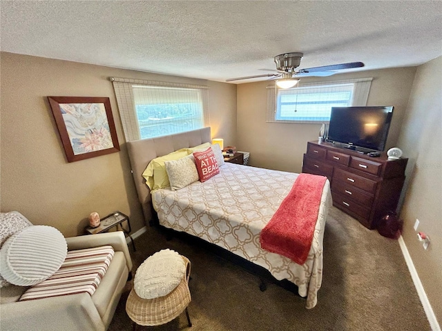 7861 Raintree Dr, New Port Richey, FL 34653 - bedroom with carpet floors, a ceiling fan, a textured ceiling, and baseboards
