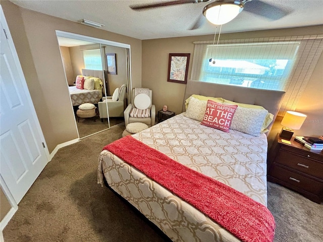 7861 Raintree Dr, New Port Richey, FL 34653 - carpeted bedroom with a closet, a ceiling fan, and a textured ceiling