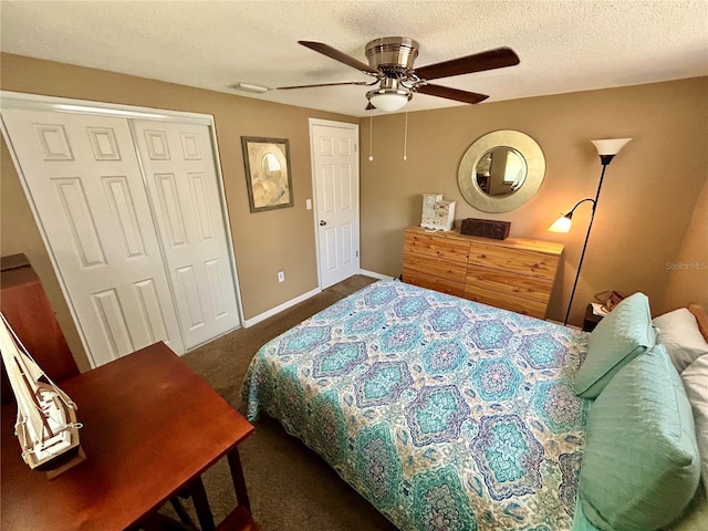 7861 Raintree Dr, New Port Richey, FL 34653 - bedroom featuring carpet floors, a textured ceiling, a closet, ceiling fan, and baseboards