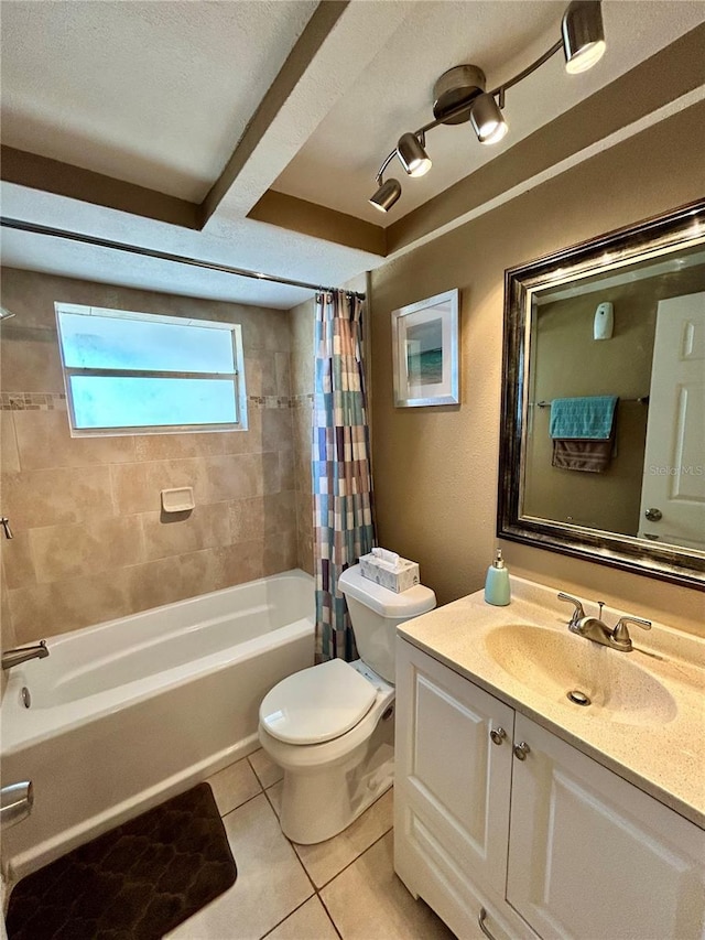 7861 Raintree Dr, New Port Richey, FL 34653 - bathroom featuring toilet, tile patterned floors, shower / bath combo with shower curtain, vanity, and a textured ceiling