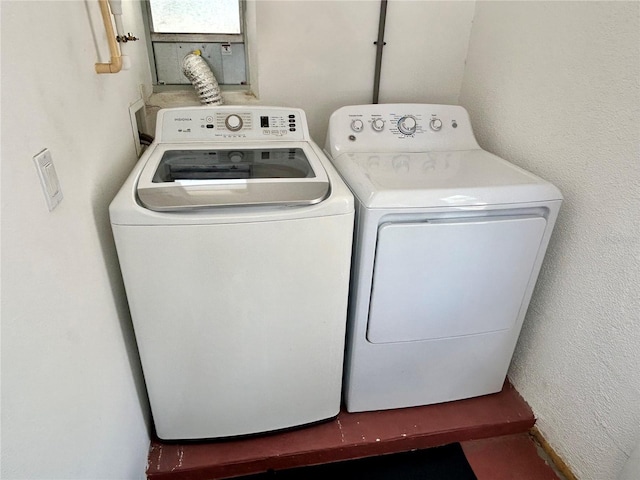 7861 Raintree Dr, New Port Richey, FL 34653 - washroom featuring washing machine and dryer