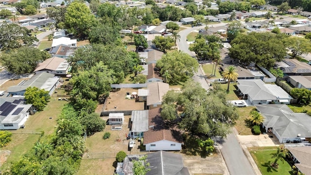 7861 Raintree Dr, New Port Richey, FL 34653 - aerial view of property and surrounding area with nearby suburban area