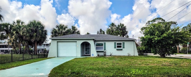 5447 Quist Dr, Port Richey, FL 34668 - ranch-style house featuring concrete driveway, stucco siding, and an attached garage