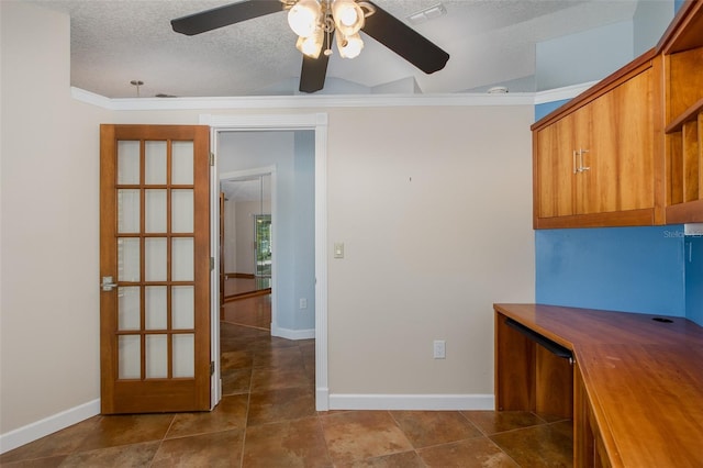 3609 Montclair Dr, New Port Richey, FL 34655 - unfurnished office featuring a ceiling fan, a textured ceiling, baseboards, vaulted ceiling, and ornamental molding