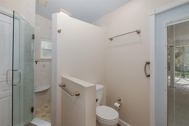 3609 Montclair Dr, New Port Richey, FL 34655 - bathroom featuring a shower stall and toilet