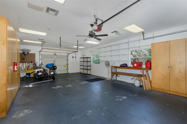 3609 Montclair Dr, New Port Richey, FL 34655 - garage featuring a garage door opener