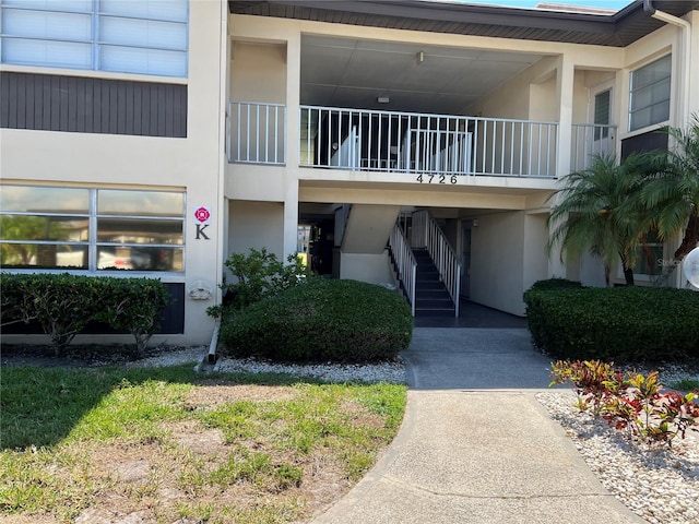 4726 Marine Pkwy Unit 104, New Port Richey, FL 34652 - view of building exterior with stairway