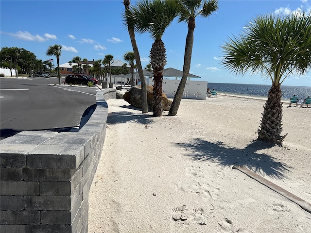 4726 Marine Pkwy Unit 104, New Port Richey, FL 34652 - view of asphalt road with a water view and sidewalks