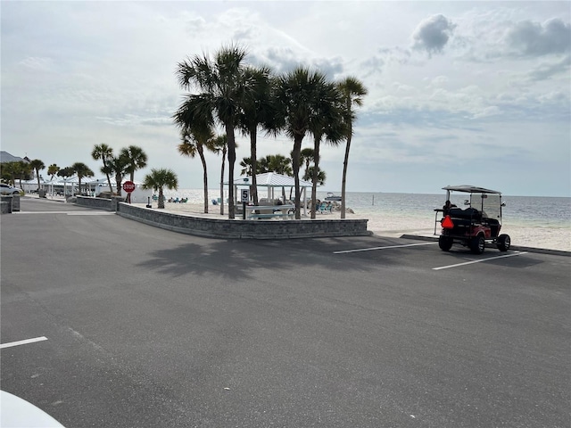 4726 Marine Pkwy Unit 104, New Port Richey, FL 34652 - view of asphalt street featuring traffic signs and a water view