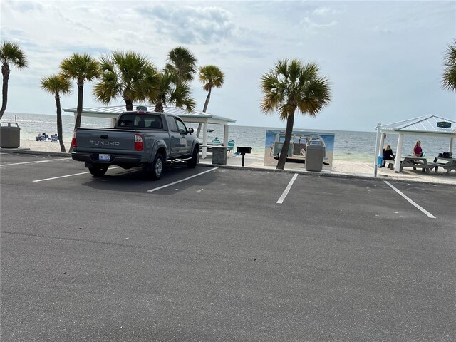 4726 Marine Pkwy Unit 104, New Port Richey, FL 34652 - uncovered parking lot with a water view