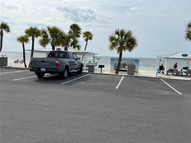 4726 Marine Pkwy Unit 104, New Port Richey, FL 34652 - uncovered parking lot with a water view