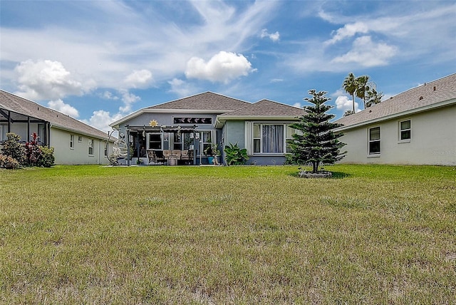 14011 Shoal Dr, Hudson, FL 34667 - rear view of house with a yard and stucco siding