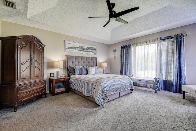 14011 Shoal Dr, Hudson, FL 34667 - bedroom with light colored carpet, a textured ceiling, and a ceiling fan