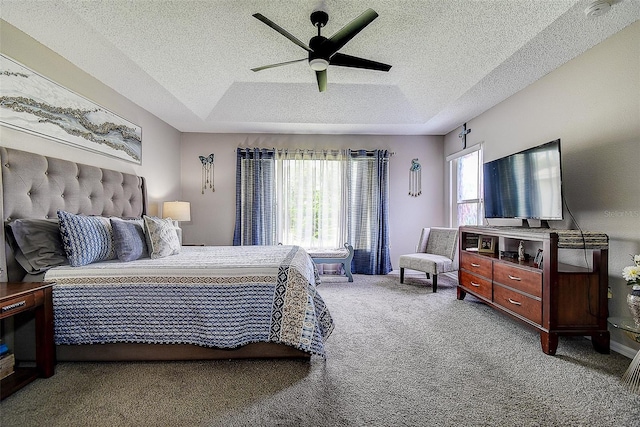 14011 Shoal Dr, Hudson, FL 34667 - carpeted bedroom with a textured ceiling and a ceiling fan