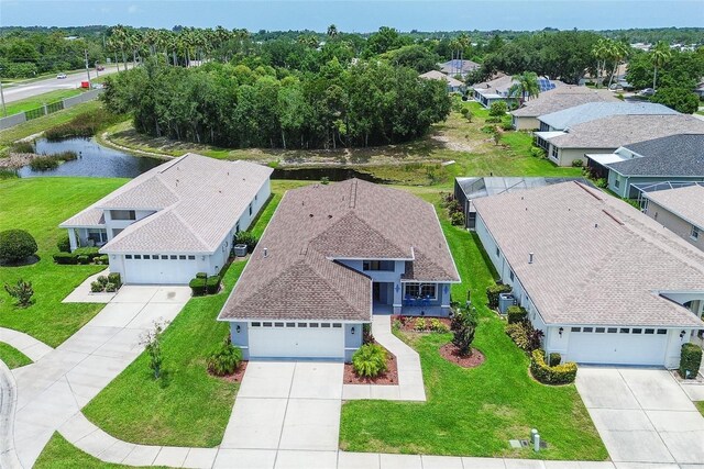14011 Shoal Dr, Hudson, FL 34667 - aerial perspective of suburban area with a nearby body of water