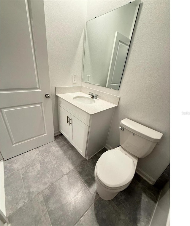 7433 Stone Creek Trl, Kissimmee, FL 34747 - bathroom featuring vanity and toilet