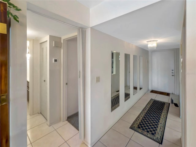5627 Ferguson Ct Unit 1303, New Port Richey, FL 34652 - hallway featuring light tile patterned flooring