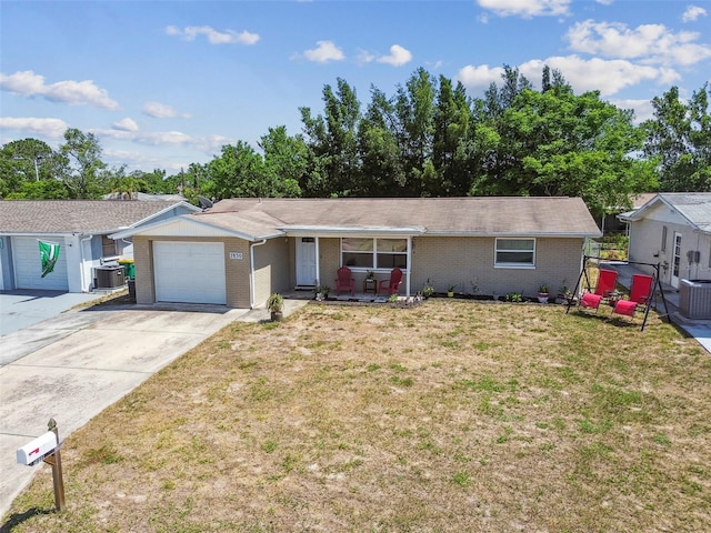 7830 Ilex Dr, Port Richey, FL 34668 - ranch-style house with brick siding, a garage, a front lawn, and driveway
