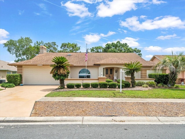 10442 Ventura Dr, Spring Hill, FL 34608 - single story home with stucco siding, concrete driveway, a garage, and a chimney
