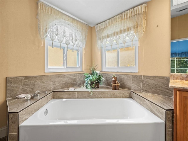 10442 Ventura Dr, Spring Hill, FL 34608 - full bathroom featuring a garden tub and vanity