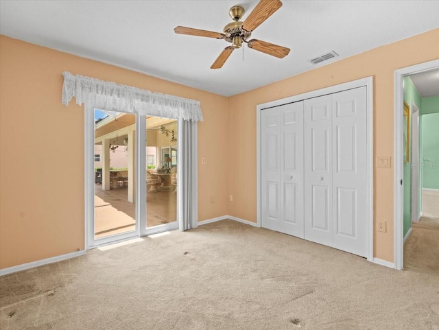 10442 Ventura Dr, Spring Hill, FL 34608 - unfurnished bedroom with carpet, access to outside, and baseboards