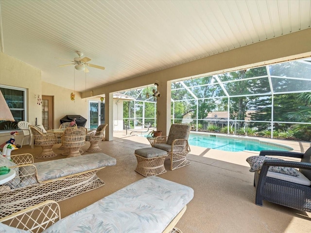 10442 Ventura Dr, Spring Hill, FL 34608 - view of patio / terrace featuring an outdoor pool, a ceiling fan, and glass enclosure