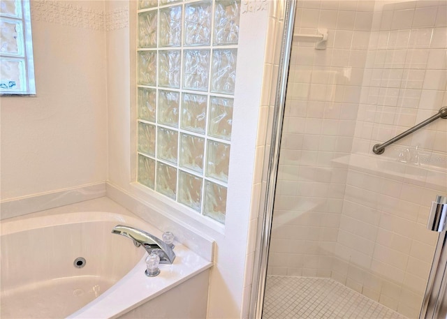 3627 Muirfield Ct Unit 3627, New Port Richey, FL 34655 - bathroom with a stall shower and a tub with jets