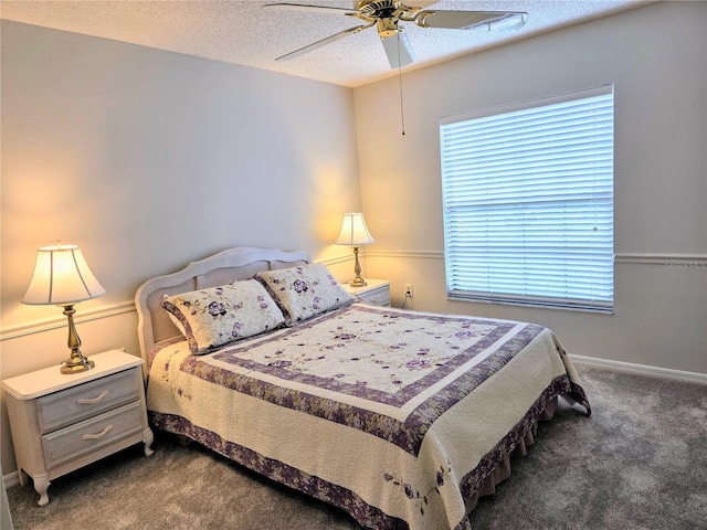 3627 Muirfield Ct Unit 3627, New Port Richey, FL 34655 - bedroom featuring dark colored carpet, a textured ceiling, ceiling fan, and baseboards