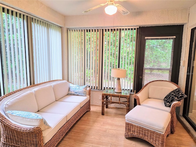 3627 Muirfield Ct Unit 3627, New Port Richey, FL 34655 - sunroom with wood finished floors and plenty of natural light