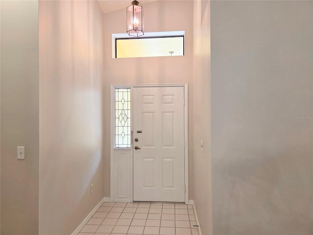 3627 Muirfield Ct Unit 3627, New Port Richey, FL 34655 - foyer with light tile patterned floors and baseboards