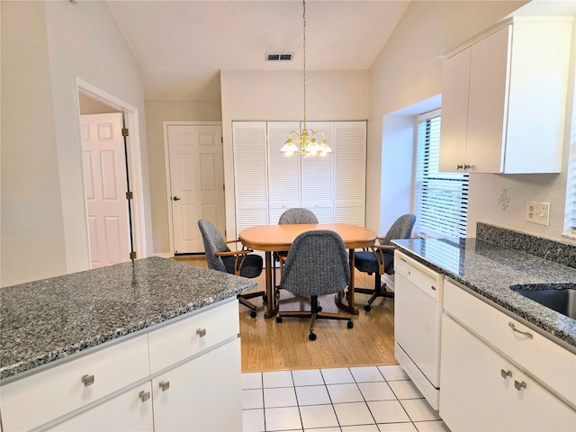3627 Muirfield Ct Unit 3627, New Port Richey, FL 34655 - dining room with a chandelier and light tile patterned floors