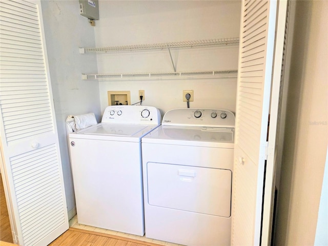 3627 Muirfield Ct Unit 3627, New Port Richey, FL 34655 - laundry area featuring washing machine and dryer and light wood-style floors