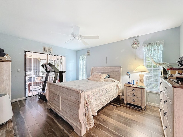 10411 Ireland St, Spring Hill, FL 34608 - bedroom with hardwood / wood-style floors, multiple windows, and a ceiling fan