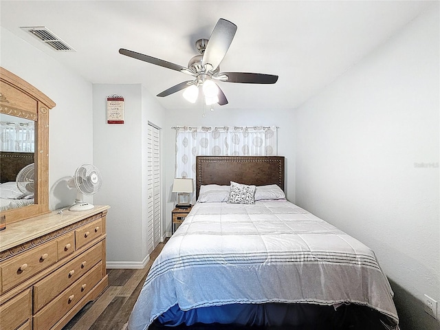 10411 Ireland St, Spring Hill, FL 34608 - bedroom featuring wood finished floors, baseboards, and ceiling fan