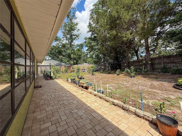 10411 Ireland St, Spring Hill, FL 34608 - fenced backyard featuring a patio
