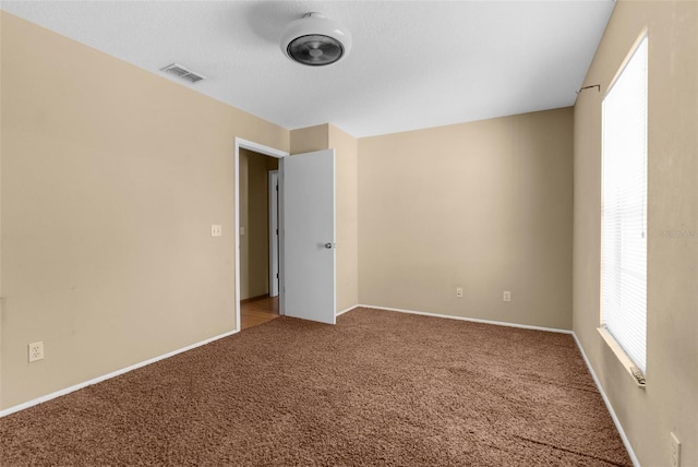4221 San Rafael Ave, New Port Richey, FL 34655 - unfurnished room with carpet and baseboards