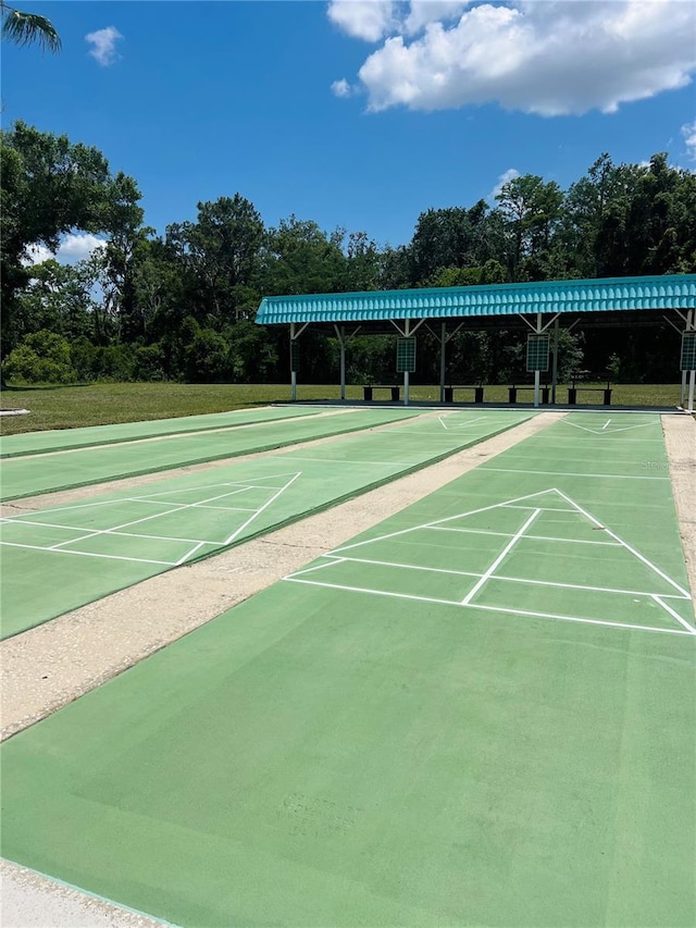 4221 San Rafael Ave, New Port Richey, FL 34655 - view of home's community with shuffleboard and view of scattered trees