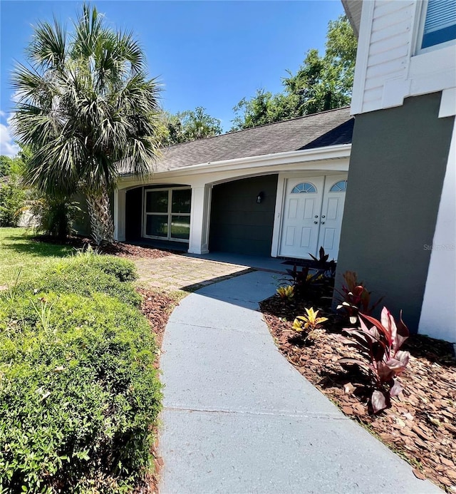 3304 Honeymoon Ln, Holiday, FL 34691 - view of exterior entry featuring a yard