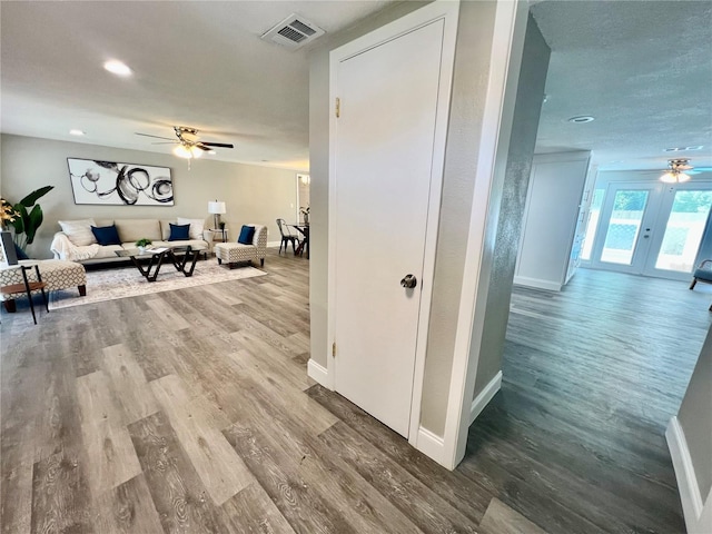 3304 Honeymoon Ln, Holiday, FL 34691 - hallway featuring wood finished floors, baseboards, and recessed lighting