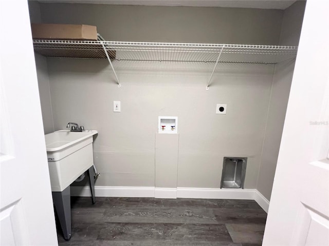 3304 Honeymoon Ln, Holiday, FL 34691 - washroom with dark wood-type flooring, baseboards, hookup for a washing machine, and electric dryer hookup