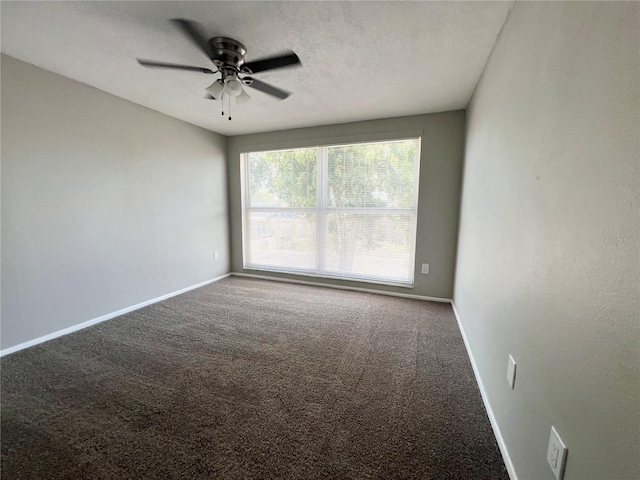 3304 Honeymoon Ln, Holiday, FL 34691 - carpeted empty room with ceiling fan and baseboards