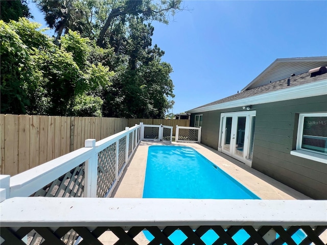 3304 Honeymoon Ln, Holiday, FL 34691 - view of pool featuring french doors and a fenced backyard