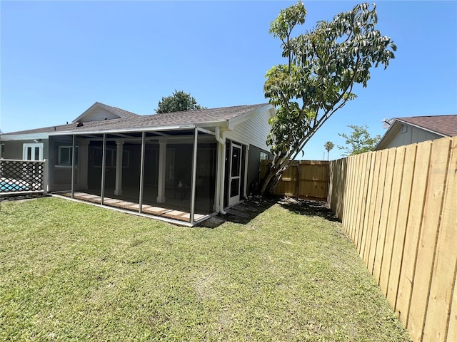 3304 Honeymoon Ln, Holiday, FL 34691 - view of yard with a sunroom