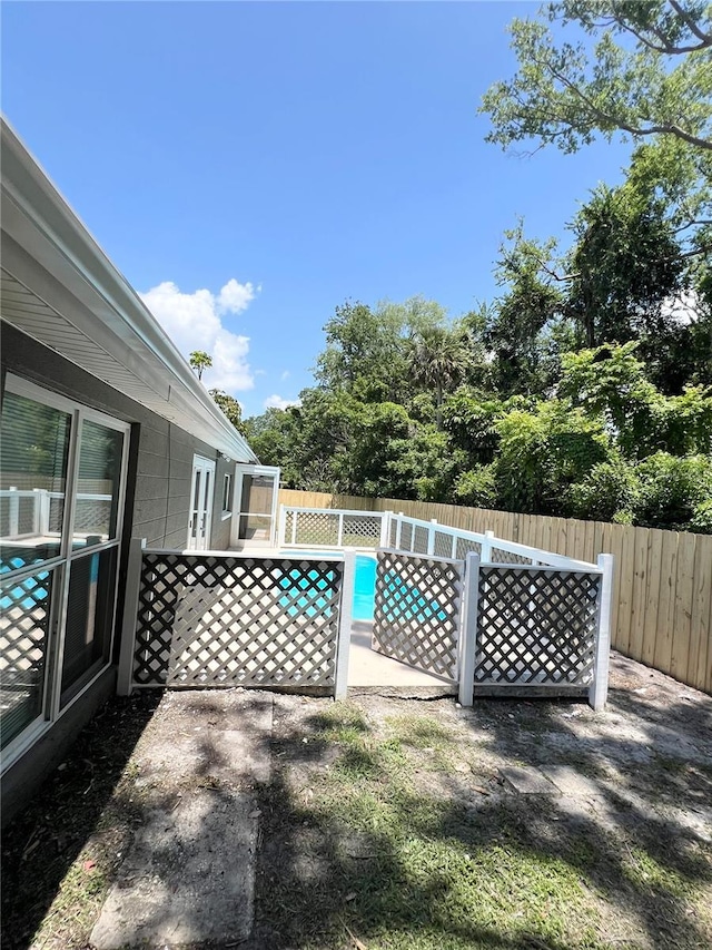 3304 Honeymoon Ln, Holiday, FL 34691 - view of fenced backyard