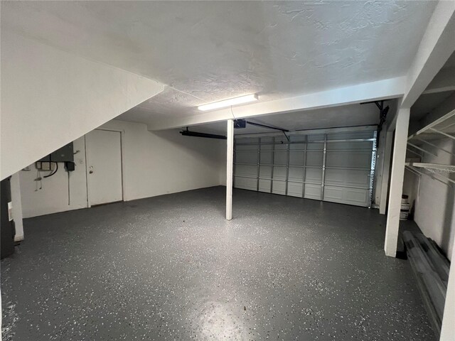 3304 Honeymoon Ln, Holiday, FL 34691 - garage with a garage door opener