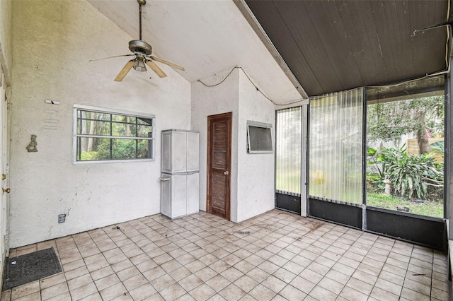 8755 Marigold Dr, New Port Richey, FL 34654 - unfurnished sunroom featuring a ceiling fan and vaulted ceiling